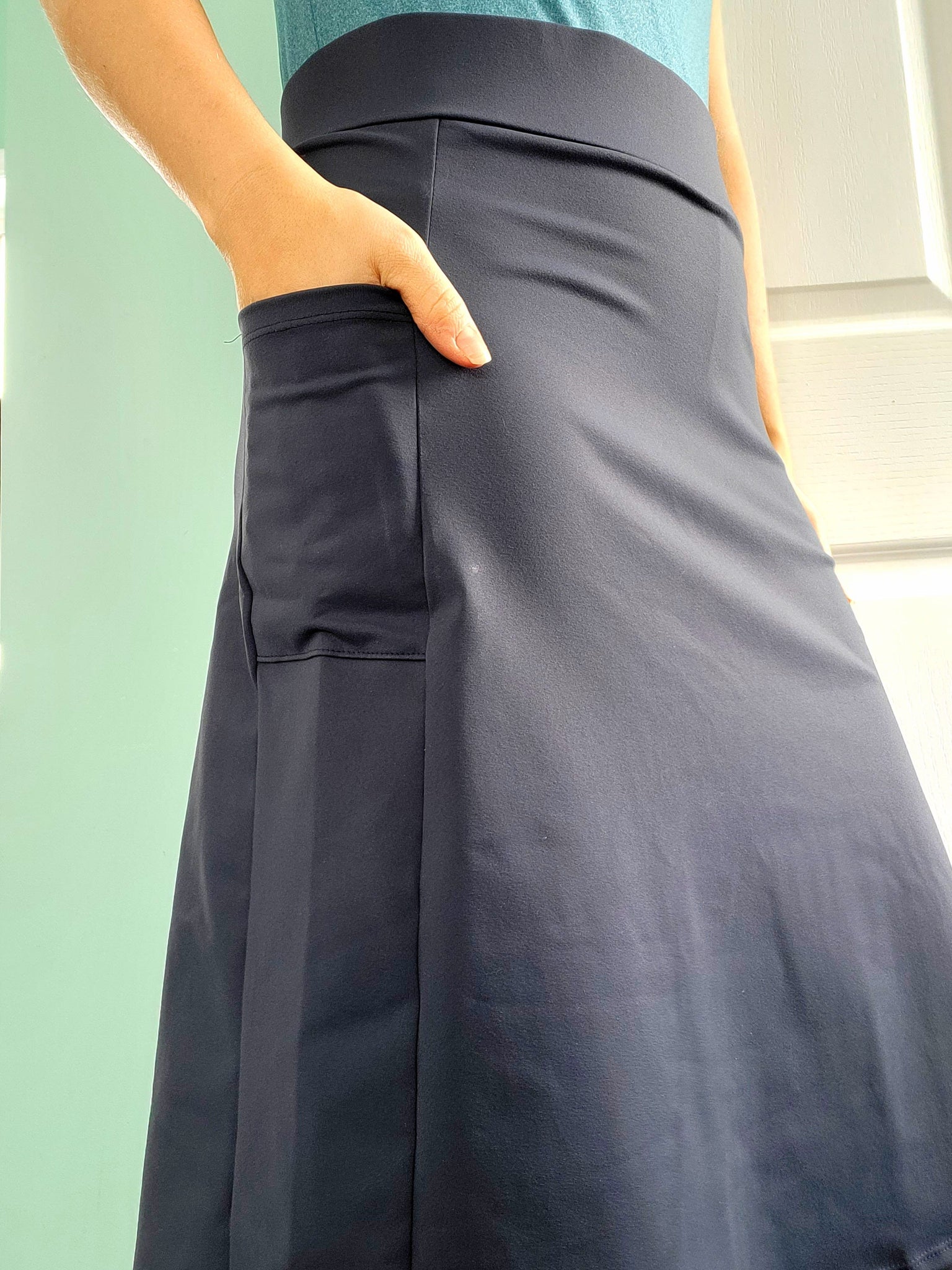 Size Medium Side Pocket Style Athletic Skirt in Navy with Hidden Leggings